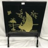 A fire screen and a mirror