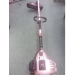 A Spear and Jackson ARG6079 petrol strimmer.