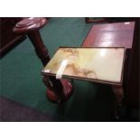 A brass and onyx table together with a jardiniere stand.