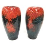 Poole Pottery studio pair of sunburst vases designed by Alan White and introduced in 2002. 13.25"