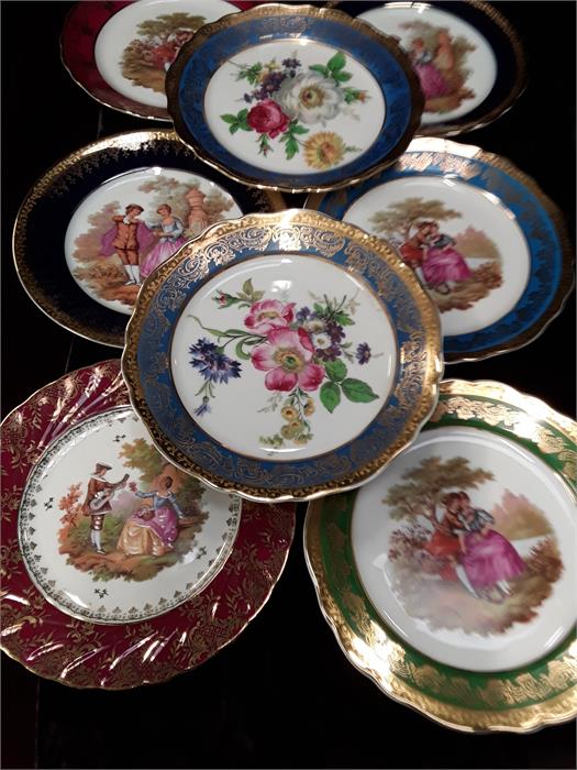 LIMOGES: Eight decorative plates.