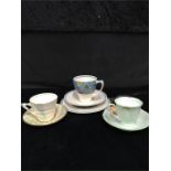 Branksome Pottery trio together with Noritake cup and saucer and Phoenix ware cup and saucer.