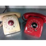 Retro finger dial telephones.