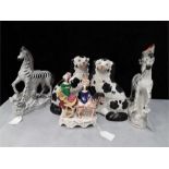 A quantity of collectable china. inc flat back figures, slip glazed planters, etc