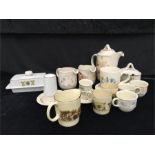 A selection of Poole Pottery tableware including jug and cups in summer glory, items in