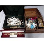 Two boxes of costume jewellery with a rotary quartz watch.