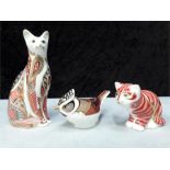 Crown Derby paperweights: Cat gold stopper, crested tit gold stopper, playful cat gold stopper.