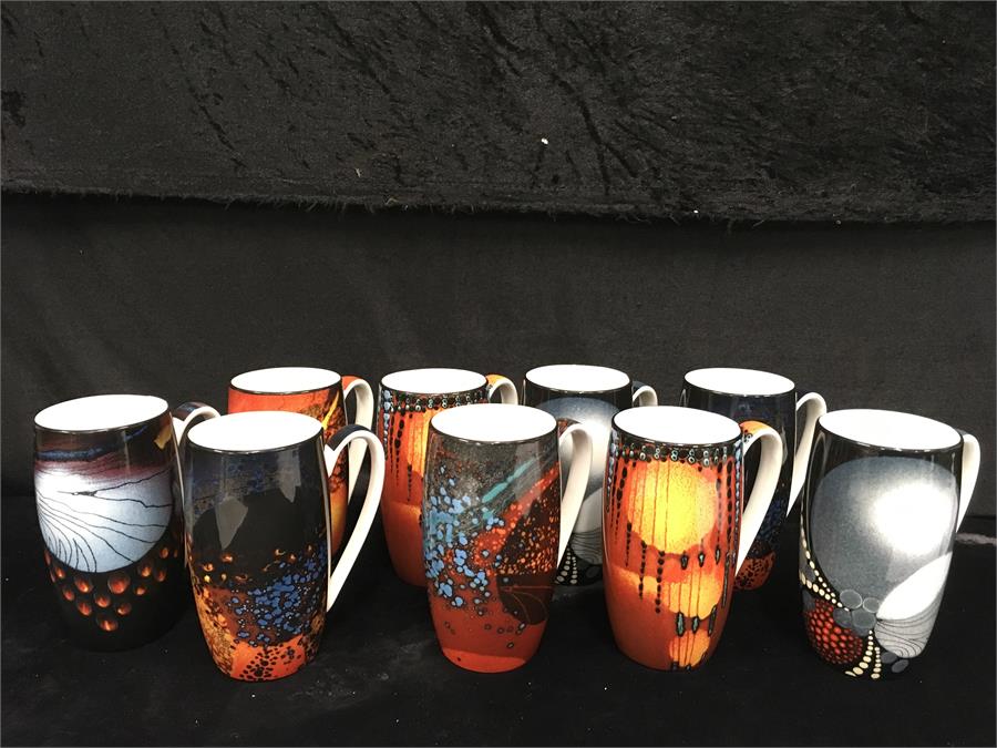 Nine mugs in fine bone china with a range of Alan Clarke studio designs - details of individual