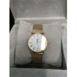 A 18ct gold men’s Longines wristwatch with 9ct gold bracelet. In box.