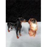 Beswick: Pekingese and Doberman.