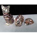 Crown Derby paperweights: Stripey cat no stopper, seated cat silver stopper, catnip kitten silver