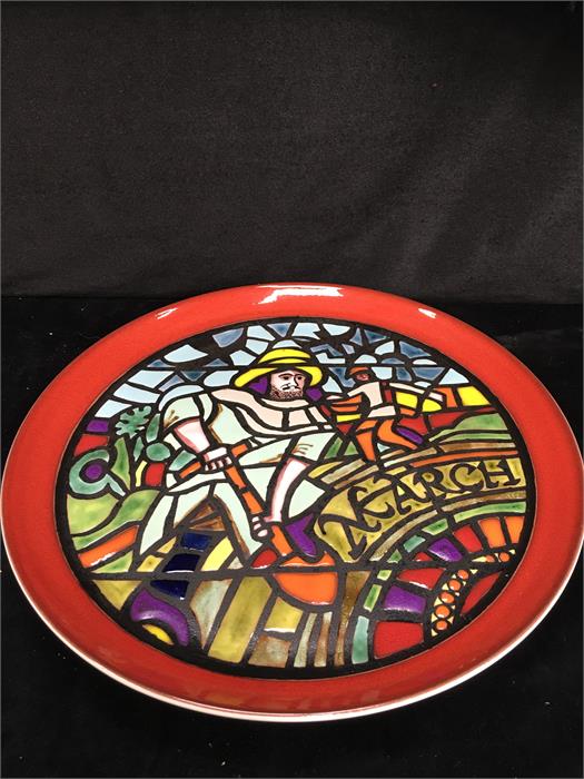 A Poole Pottery medieval calendar plate designed by Tony Morris.