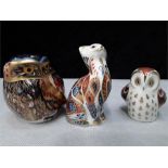 Crown Derby paperweights: Owl gold stopper, cat gold stopper, bowler gold stopper.