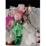 A small quantity of vintage glass Christmas decorations and fairy tree toppers.