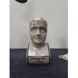 A phrenology bust.