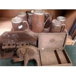 A collection of wooden beakers and other items, with the Royal Engineers motif engraved on them