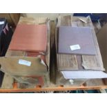 Two boxes of terracotta floor tiles.