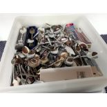 Approximately 140 souvenir spoons.