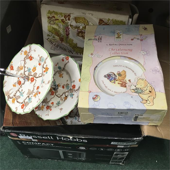A box containing nursery sets by Royal Doulton and Wedgwood and other chinaware