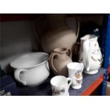 A collection of pots, cups and jugs.