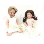 Two early 20th century German bisque head dolls: Armand Marseille/ Koppelsdorf doll marked 'AM