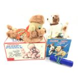 Cragstan (Japan) Sleepy Poodle: flock covered tinplate poodle with clockwork motor, when wound