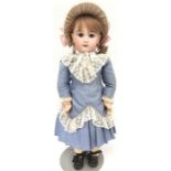 Late 19th century Tête Jumeau Bébé (France) bisque socket head doll with red stamped marking 'Depose