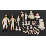 Selection of miniature doll's house dolls and doll parts, includes a wooden jointed Dutch style doll