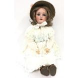 Early 20th century Schoenau and Hoffmeister (Germany) bisque head doll impressed 'SH 1909 7 1/2