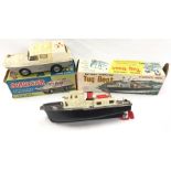 Two Hong-Kong made plastic battery operated boats: SH Toys Aquacar, length 23cm (tape to cabin