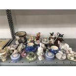 A collection of china to include a Royal Crown Derby duck, Wedgwood Jasperware, Masons etc.