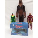 A Thunderbird flashlight, a Chewbacca figure together with two action heroes: Vision and Iron Man.