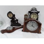 Various clocks and a barometer.