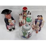 A Staffordshire ornament, a oriental ginger jar and two Toby jugs one musical.