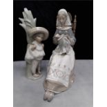 Lladro: Mexican boy figurine with a lady in period clothing doing embroidery, no box.