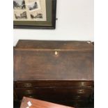 An oak open top bureau.