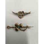 An Art Nouveau 9ct gold turquoise and seed pearl brooch together with an Art Nouveau 15ct gold and