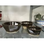 Three Leach pottery brown glazed bowls.