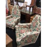 a pair of 1920 His and Her’s chairs. in the queen Ann taste covered in floral printed linen