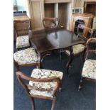 A set of Six Victorian rosewood dining chairs.with shaped backs