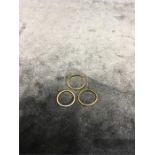 Three 9ct gold rings.