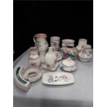 A quantity of Poole Pottery items.