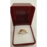 A 9ct gold ring set stones.