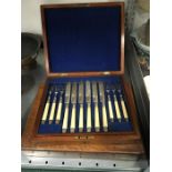 Two sets of silver plated fish knives and forks, boxed.