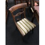 Two Victorian rosewood with carved backs dining chairs.