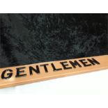 A Gentlemen sign.