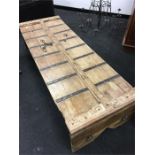 An Indian hardwood coffee table made from old wooden doors.