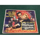 A vintage film poster for “Portrait In Black” starring Lana Turner, Anthony Quinn, Sandra Dee,