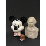 A Wade mid 20th century Mickey Mouse money box together with a bust and small wooden lion.