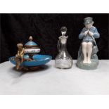 Royal Copenhagen: Boy fishing ref 905, grapes and vine small glass oil pourer, with a metal candle